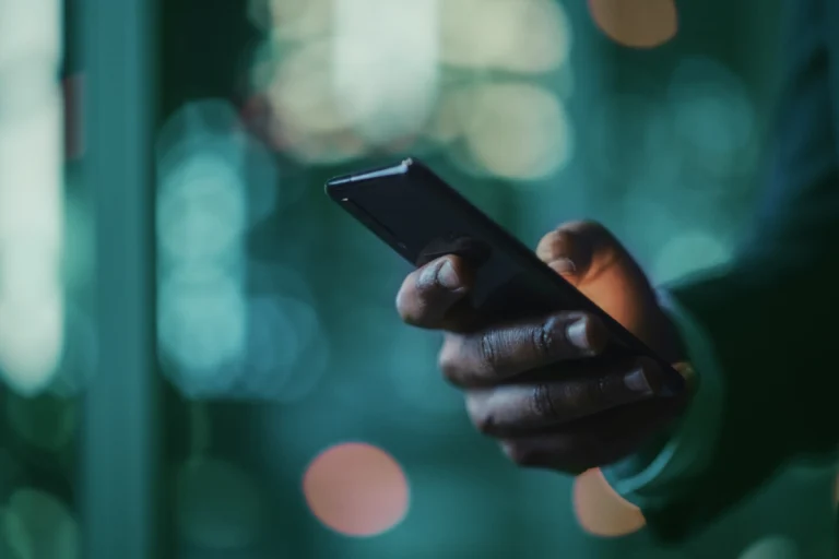 Man holds cell phone